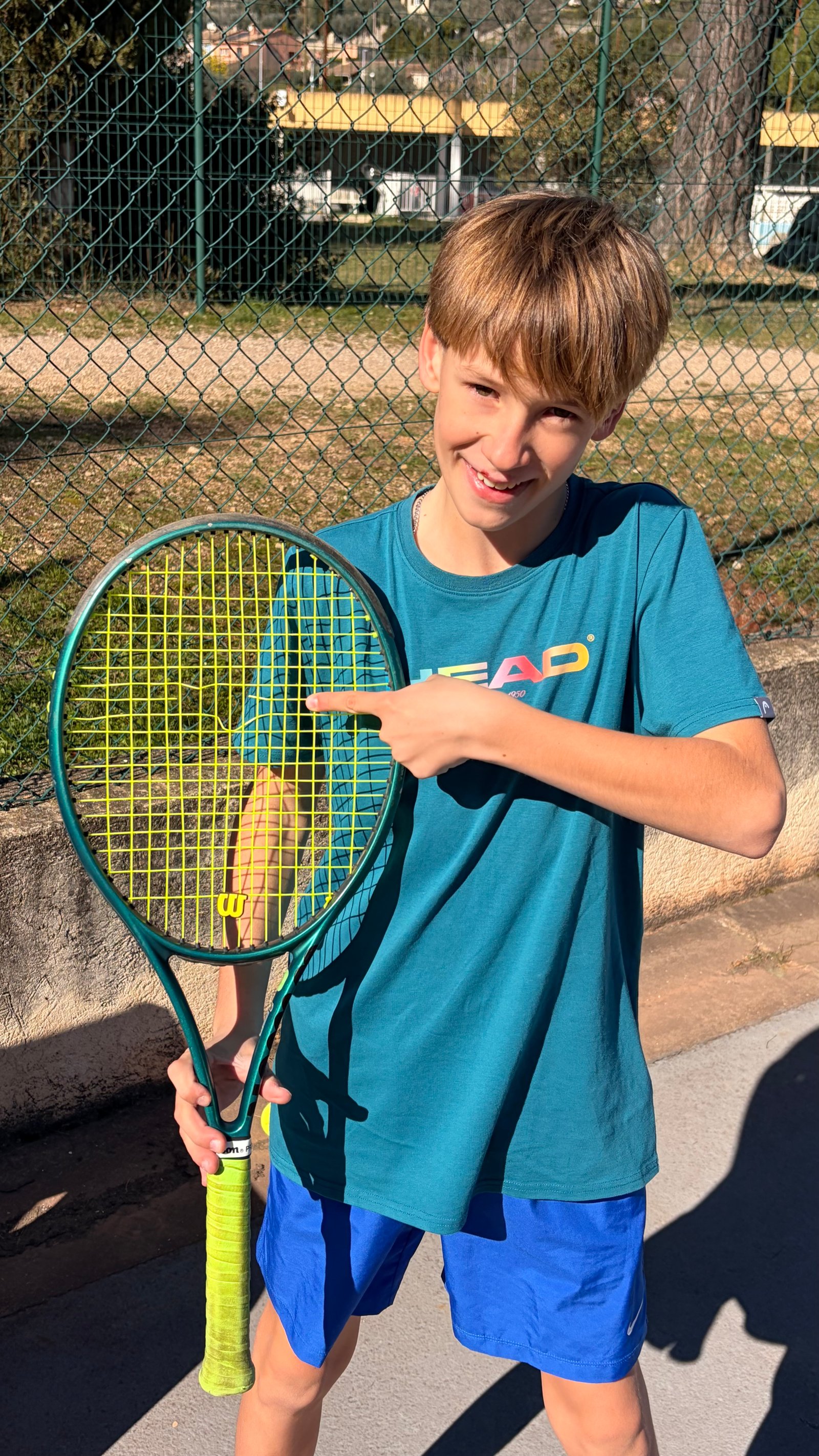 Oscar hitting a forehand